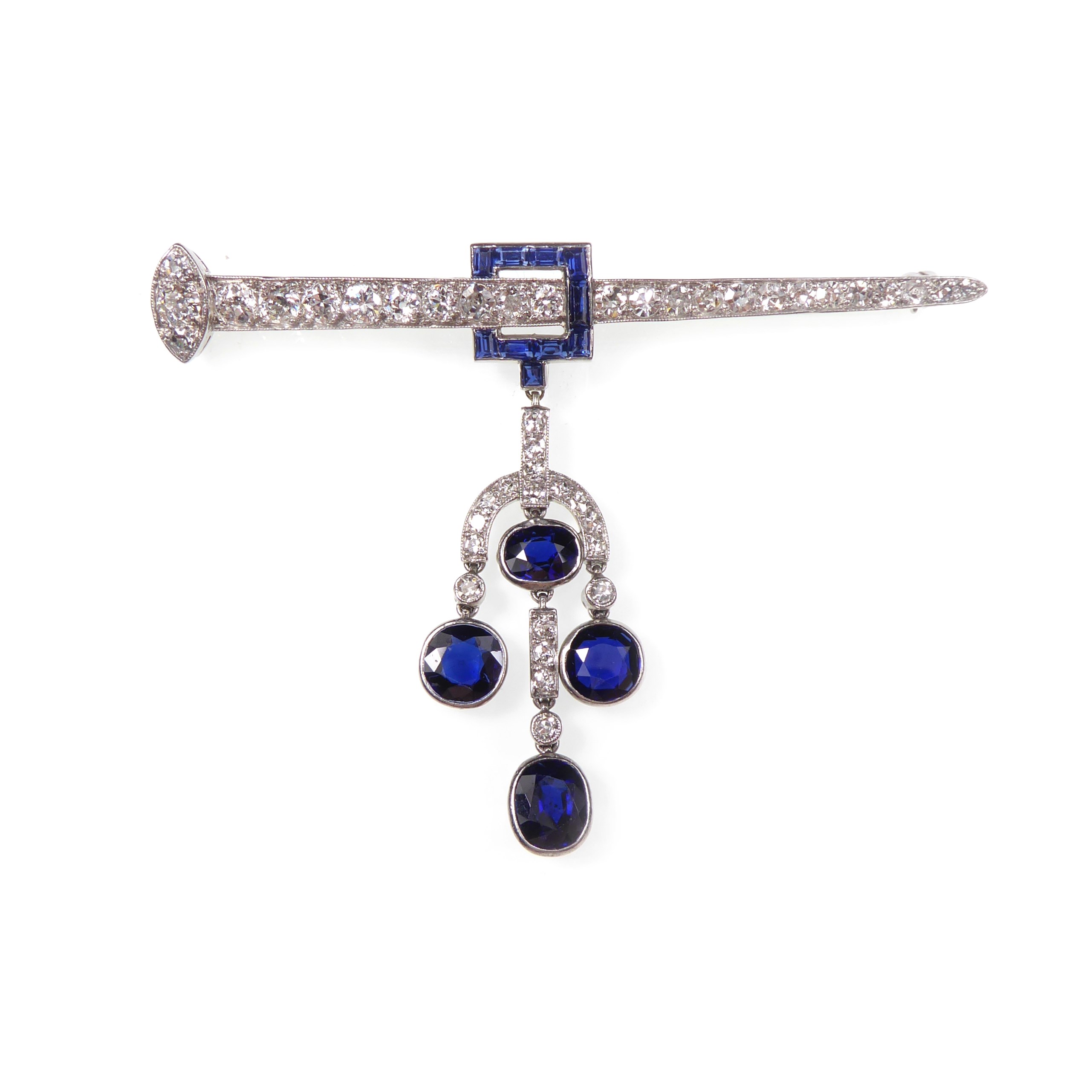 Early 20th century cushion sapphire and diamond triple drop 'nail' bar brooch by Cartier, c.1915,
